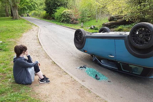 Woman returns from walk in countryside to find vandals have flipped her car on its roof