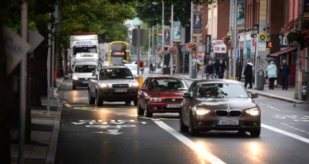 Dublin commuters are reporting long delays with new car restrictions on the quays