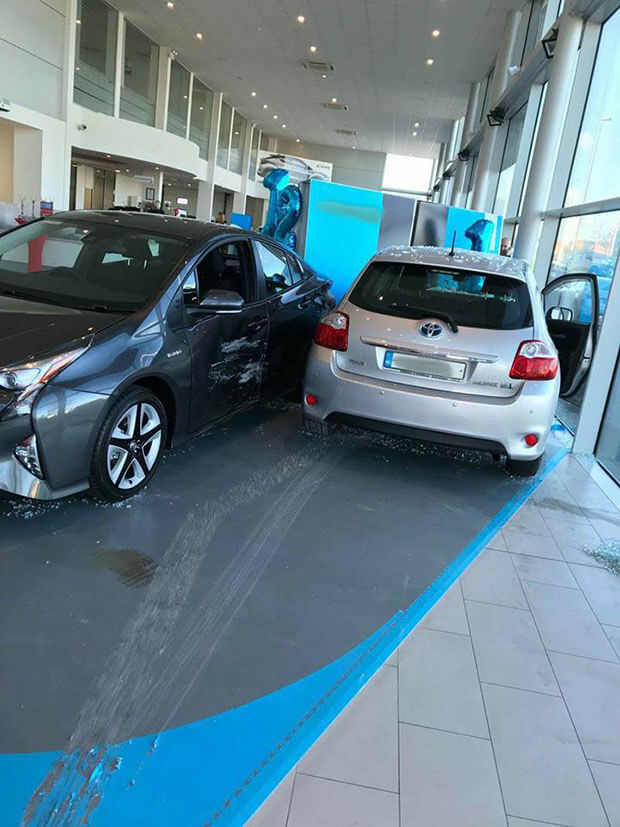 Car buying customer destroys 6 cars and ploughs car into showroom