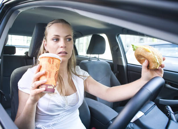 Survey reveals 50% of drivers eat or drink behind the wheel 