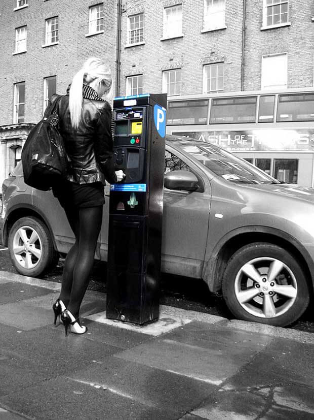 Girl at parking meter Dublin