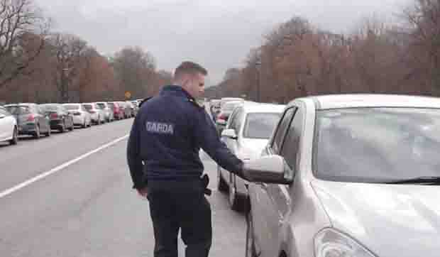 Garda checking for unlocked cars on Chesterfield Avenue in the Phoenix Park